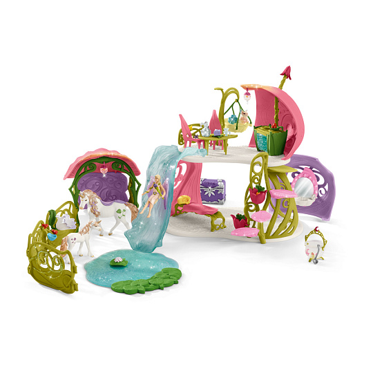 Schleich 42445 Třpytivý květinový dům s jednorožci, jezerem a stájí